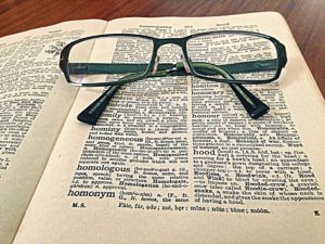 Dictionary and glasses